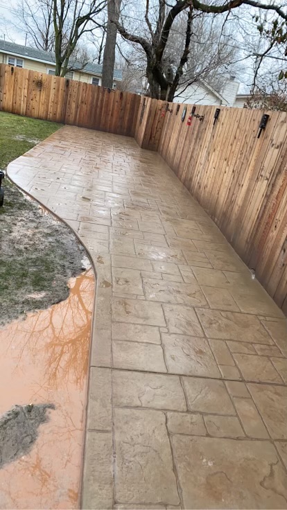 Stamped concrete patio with ornamental design