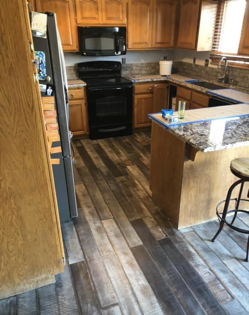 Finished kitchen with wood cabinets and updated layout