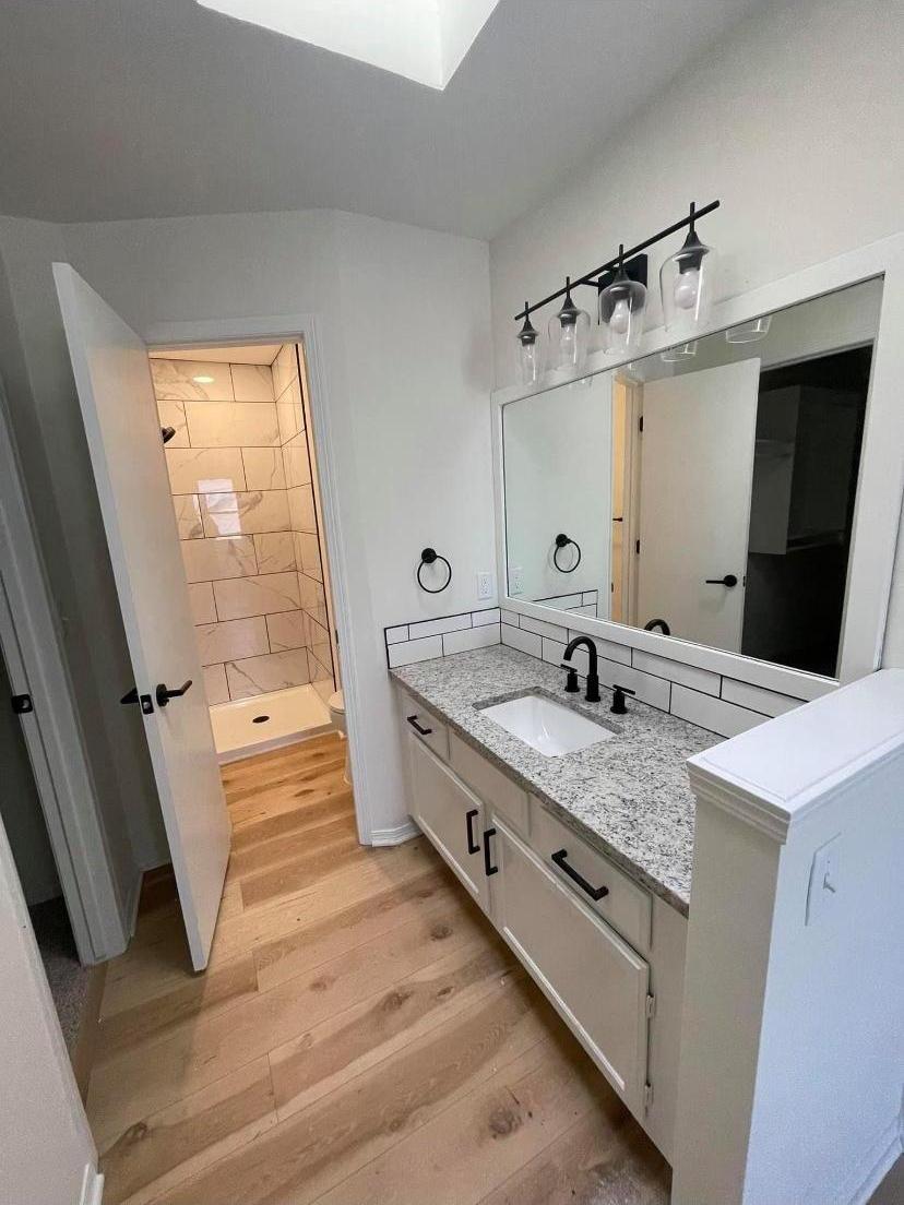 Completed luxury master bath with dual vanity and marble shower