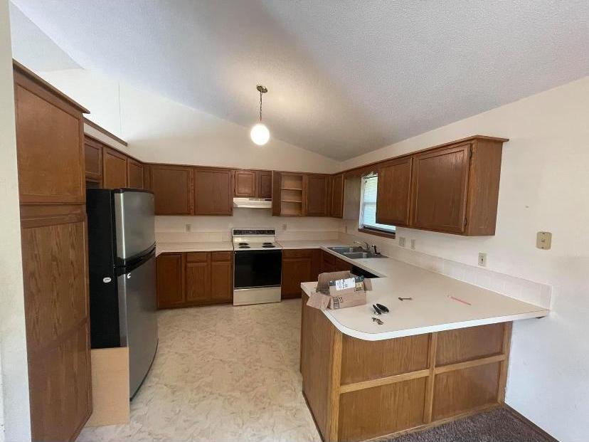Finished kitchen with wood cabinetry